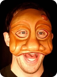 Arlechino commedia mask being worn